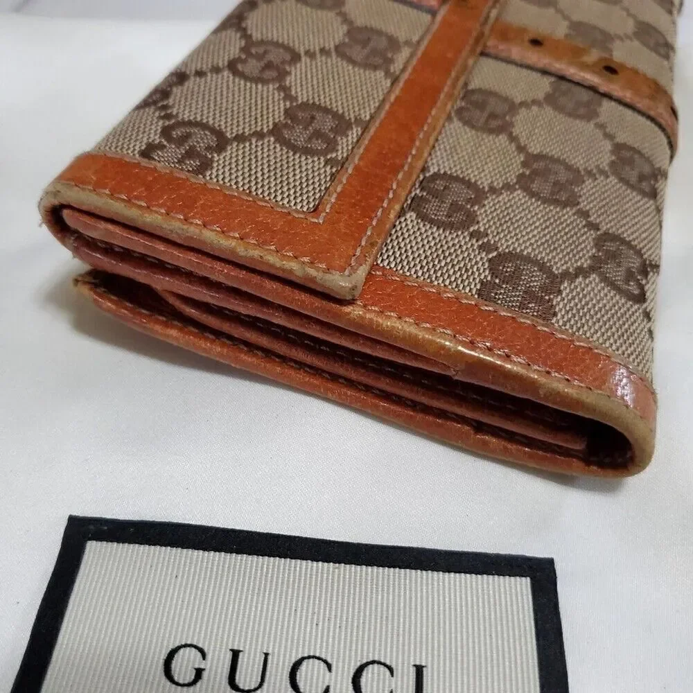 Gucci GG Logo Continental Canvas Tan Bifold Wallet with Leather Trim. 1462012778